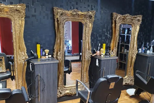 Inside: gilded mirrors and dark walls